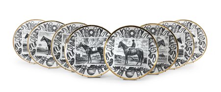DODICI PIATTI IN PORCELLANA DI PIERO FORNASETTI, ANNI '70
