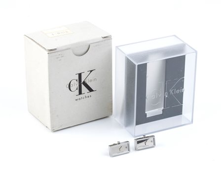 
CALVIN KLEIN: Paio di gemelli in acciaio con orologi 
 