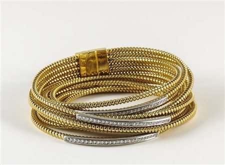 BRACCIALE IN ORO GIALLO - GOLDEN BRACELET realizzato a sei fili a molla...