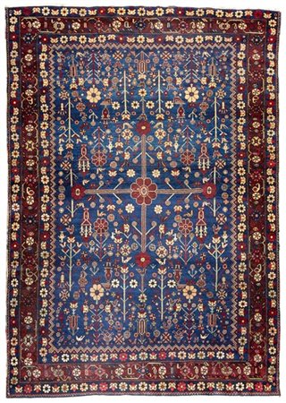 Tappeto Qashqai, Persia, inizio secolo XX. Decoro con albero della Vita, volati