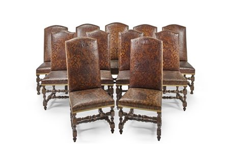 Undici sedie diverse in noce rivestite in cuoio impresso a volute e gentildonna