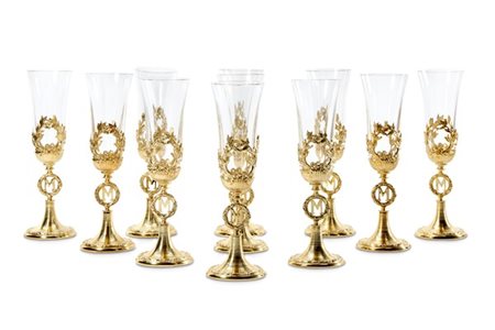 Gruppo di dodici flutes in cristallo stelo in argento dorato centrato da "M" en