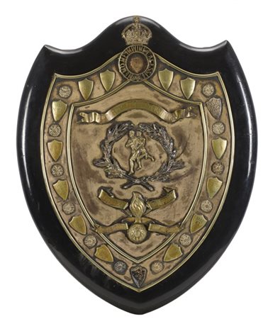 Crest in legno ebanizzato con placca in metallo argentato del Primo Battaglione