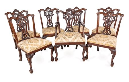 Sei sedie ed una poltrona in mogano, Inghilterra, XIX secolo cm 98x60x52 e cm...