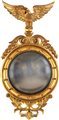 Specchiera "bull's eye" in legno dorato, Inghilterra, XIX secolo cm 96x49...
