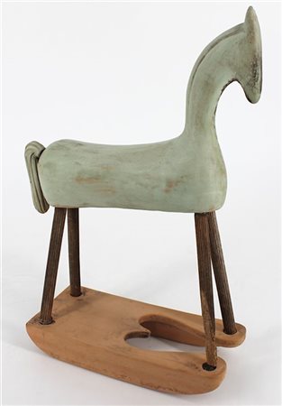 "Cavallo a dondolo"
Scultura in terracotta e legno. (cm 20x30) (difetti)