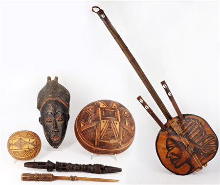 Arte africana. Lotto composto da una maschera in legno dipinto, due ciotole, un