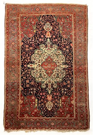 Tappeto Sarouk, Persia, secolo XX. Decoro con medaglione polilobato con puntali