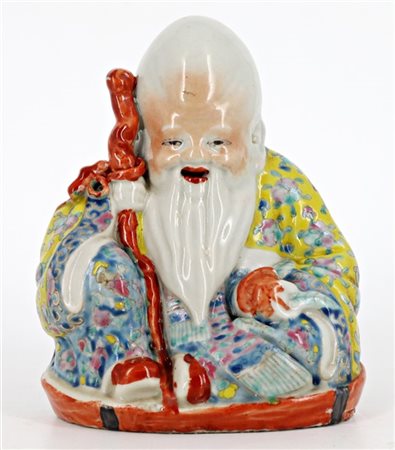 Buddha in porcellana policroma 
Cina, secolo XX 
(h cm 15)(lievi difetti)