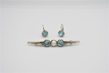 Demi-parure in oro bianco