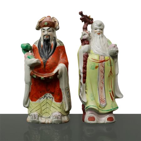 Coppia di statuette cinesi in porcellana