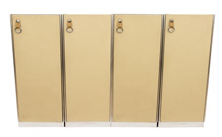 Armadiatura a 4 moduli in legno rivestito in suedine blu e pelle bianca. Maniglie in acciaio.   Guido Faleschini