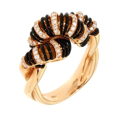 ANELLO Anello in oro giallo, sommità traforata ad intreccio, con smalto nero...