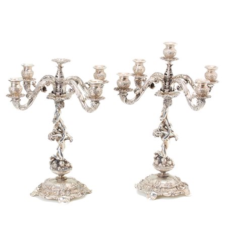  
Coppia di candelabri in argento 
 