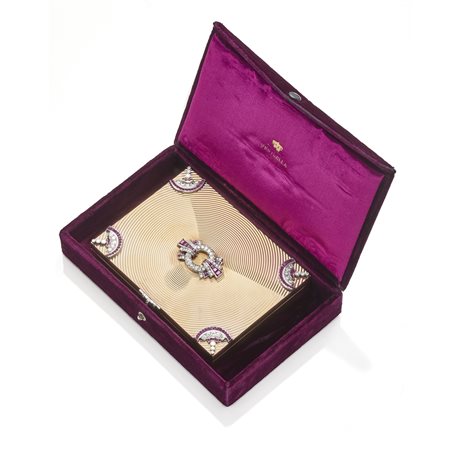  
vanity case Ventrella in oro diamanti e rubini con scatola 
 