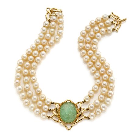  
Choker in oro a tre fili di perle 
 
