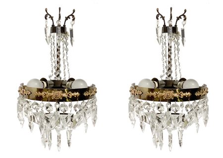 Coppia di appliques in metallo dorato e cristalli, 70's