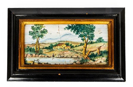 Mattonella maiolicata rettangolare con paesaggio, caseggiati e viandante che cerca di guadare un fiume.    Manifattura del centro Italia della metà del XX secolo