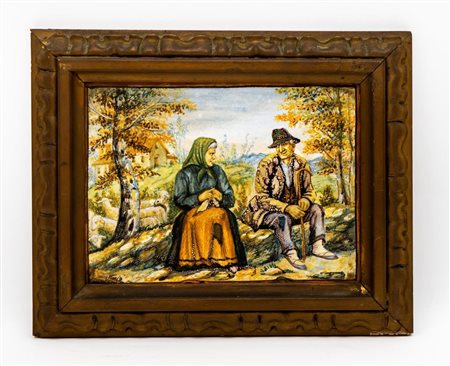 Mattonella maiolicata raffigurante coppia di anziani e intitolata al retro "quando un'anima parla".   Mario  D'Ilario