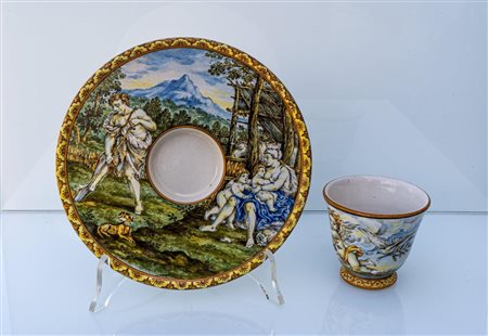 Chicchera Ideart con scena bucolica sul piattino trembleuse e coppia di putti nella chicchera   