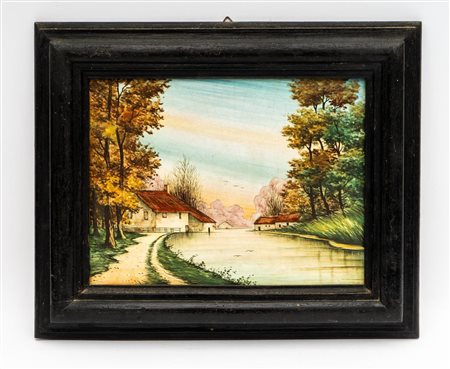 Mattonella maiolicata dipinta con ornato a paese.  Mario  D'Ilario