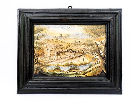 Mattonella maiolicata con paesaggio di Borbona, Amatrice e Cittá Reale. Svetta sullo sfondo il massiccio dei Monti della Laga   Manifattura del Centro Italia della fine del XVIII secolo