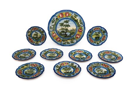 Servizio da tavola formato da un grande piatto da portata e da nove piattini riccamente dipinti con decoro cd. "a tombolino" Giuseppe  D'Amore