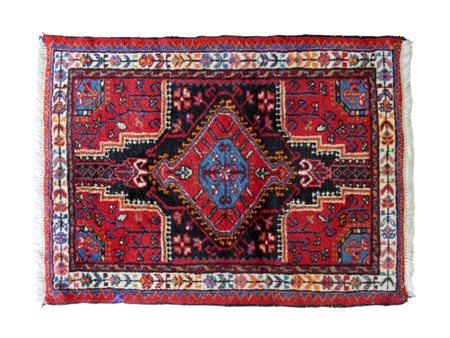 Piccolo tappeto di gusto caucasico a fondo rosso