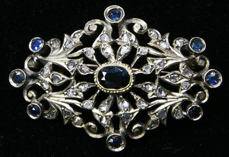 SPILLA IN ARGENTO, ORO A BASSO TITOLO, DIAMANTI E ZAFFIRI...