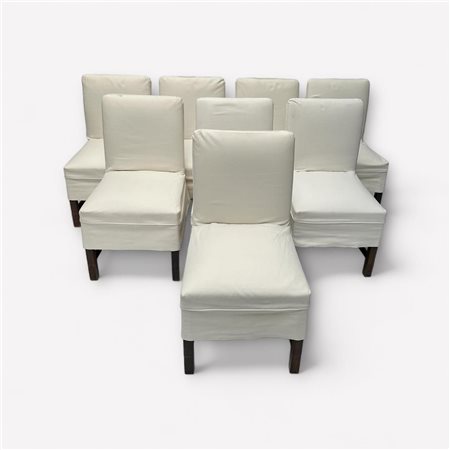 A set of (8) oak dining chairs all with heavy linen covers. late 19th / early...