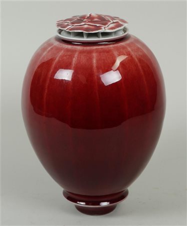 A red glazed decorative vase by Xavier Duroselle (B.: 1962), minor damage to...