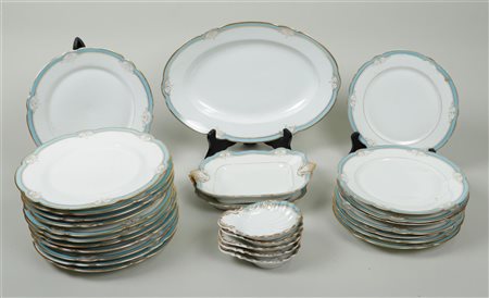 A porcelain service part with blue painted rim and gold accents, marked Vieux...