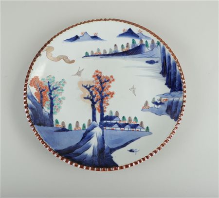 A large Imari dish with landscape decoration. Japan, Edo period, 18th...