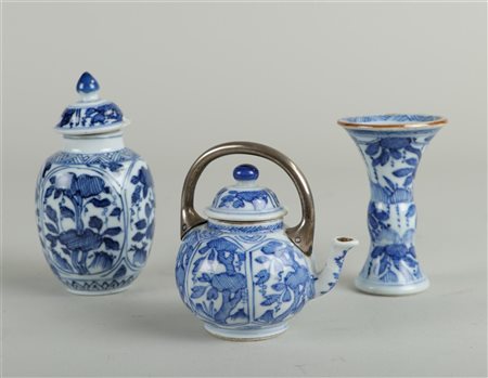 A lot of three porcelain miniature objects with floral decoration in borders....