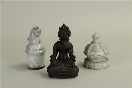 A lot consisting of a bronze Buddha with turquoise gemstone in crown,...