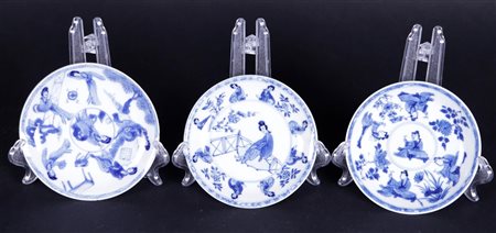 Three porcelain saucers with a decor of long Elizas, marked in a double...