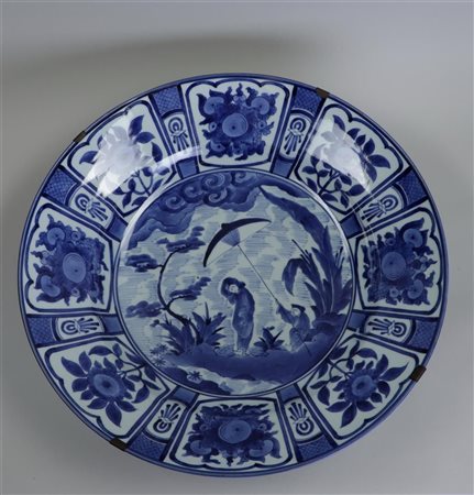 A capital Japanese blue and white Arita dish after Cornelis Pronk, 'The...