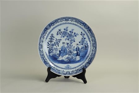 A Chinese dish with a representation of court ladies in a garden, China 18th...