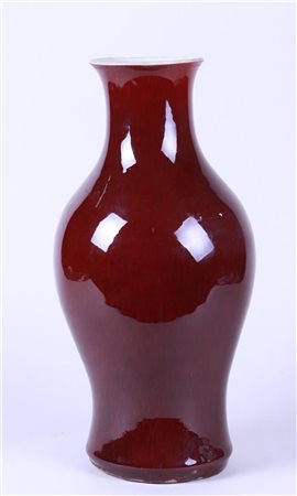 A large porcelain Sang de Boeuf vase, baluster model. China, 19th century.H.:...