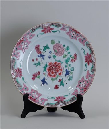 A porcelain famile rose plate decorated with peonies. China, 18th...