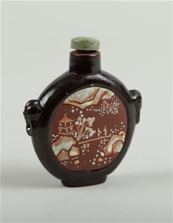 A Yixing snuff bottle with landscape decoration. China, 19th century.H. 8 cm.