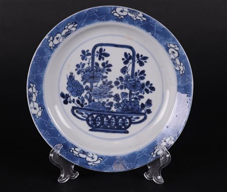 A porcelain bordje with handle basket decor center decor and `broken' ice...