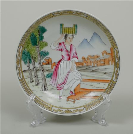 A porcelain European dish with an erotic representation on the back. China,...
