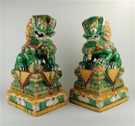 A set of (2) Sankai, green glazed, earthenware foodogs. 20th century.H.: 58 cm.
