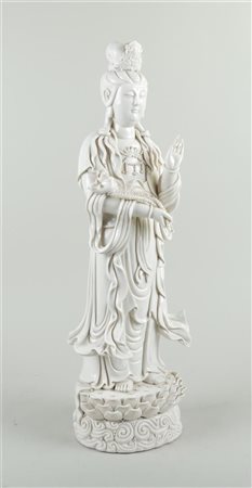A porcelain blanc de Chine standing qianyin on lutusbase. China, 20th...