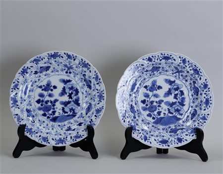 A set of two porcelain plates with crab and bass decoration. China, 19th...