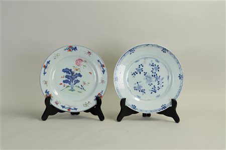 A lot consisting of (2) Chinese plates, one polychrome, the other blue and...