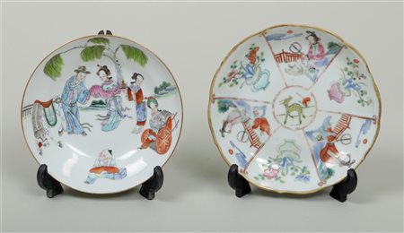 A set of two famile rose plates with decoration of various figures, marked on...