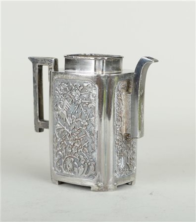 A silver teapot decorated with birds and flowers. China, Kangxi. 325 grams.H....