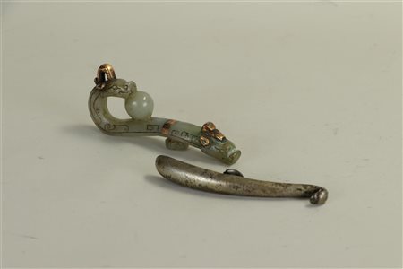 A lot consisting of (2) buckles, The first (iron) Han dynasty, The other...